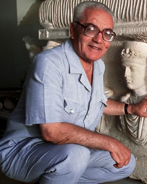 Khaled al-Asaad with Palmyrene funerary reliefs